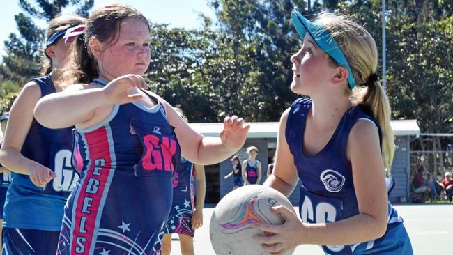 ON A ROLE: Grace Kelleher in attacking position about to score a point in the netball under 12s carnival held in Gympie today. Picture: Philippe Coquerand