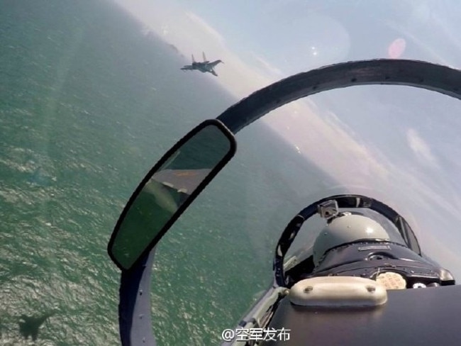 Chinese Su-30 combat jets reportedly pictured over the South China Sea.