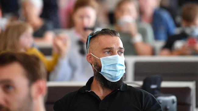 Mask wearing could stay for two weeks after lockdown. Picture: NCA NewsWire / David Mariuz