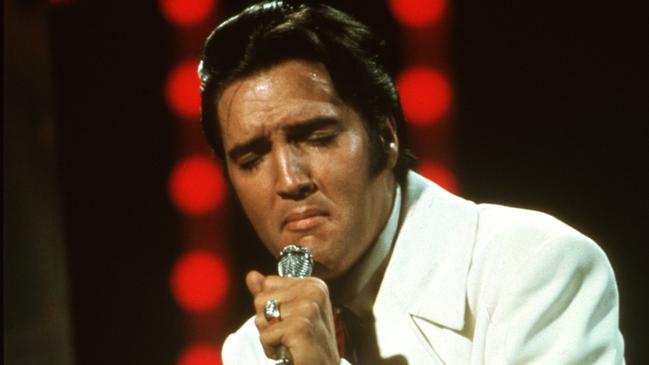 Elvis Presley performing in 1968. Picture: Michael Ochs Archives/Getty Images