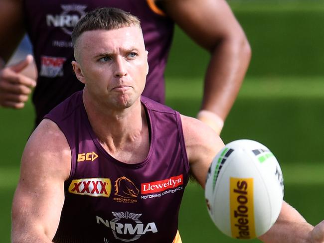 Brisbane Broncos players Jake Turpin (front) and Payne Haas are seen during training in Brisbane, Thursday, June 13, 2019. (AAP Image/Dan Peled) NO ARCHIVING