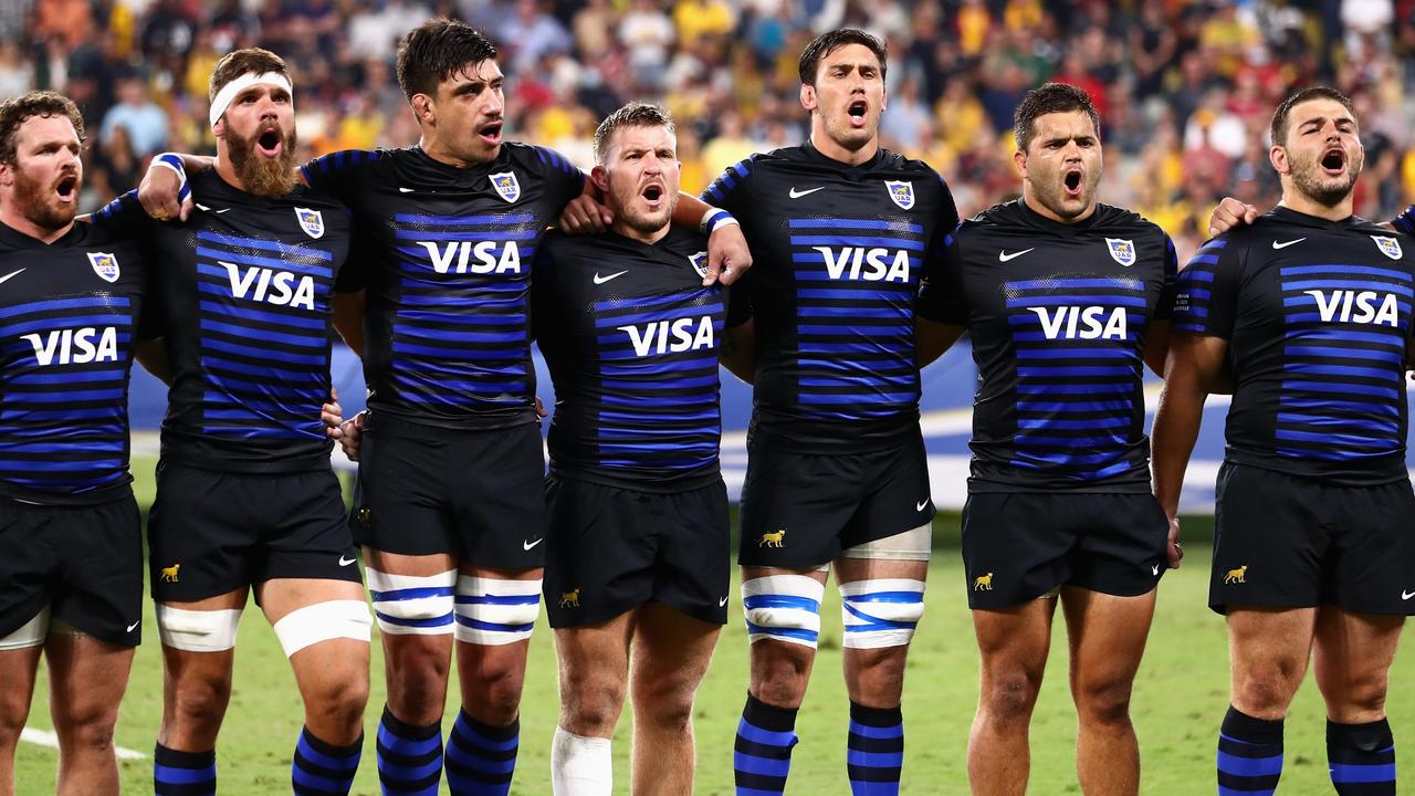 The Pumas line up for the Argentinian national anthem in Townsville (Photo by Chris Hyde/Getty Images)