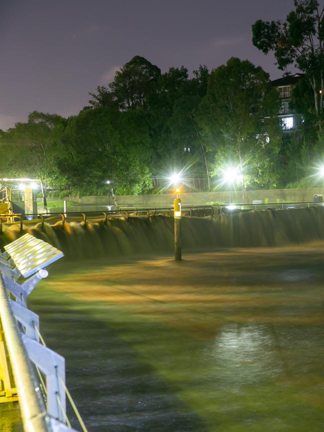 Water flowing over Parramatta weir. Picture: TNV