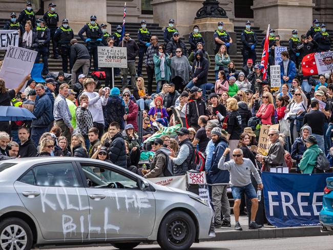 Protesters gather on the steps of Victorian parliament to protest the new pandemic bill in response to the Covid 19 pandemic. Picture: Jason Edwards