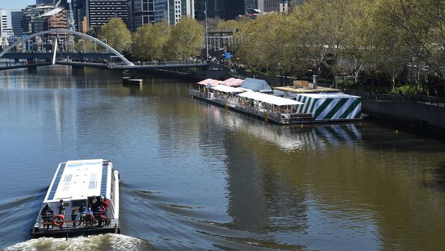 Warmer weather has signalled the return of floating bar on the Yarra River. Picture: Tony Gough