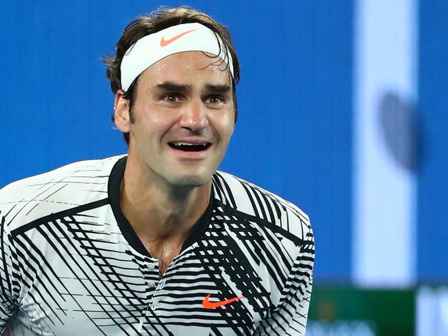 Roger Federer celebrates winning championship point at the 2017 Australian Open. (Photo by Cameron Spencer/Getty Images)