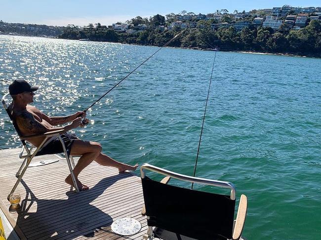 Michael Clarke enjoying his ‘vitamin sea’ fishing off the back of his mate Anthony Bell’s boat. Picture: Instagram