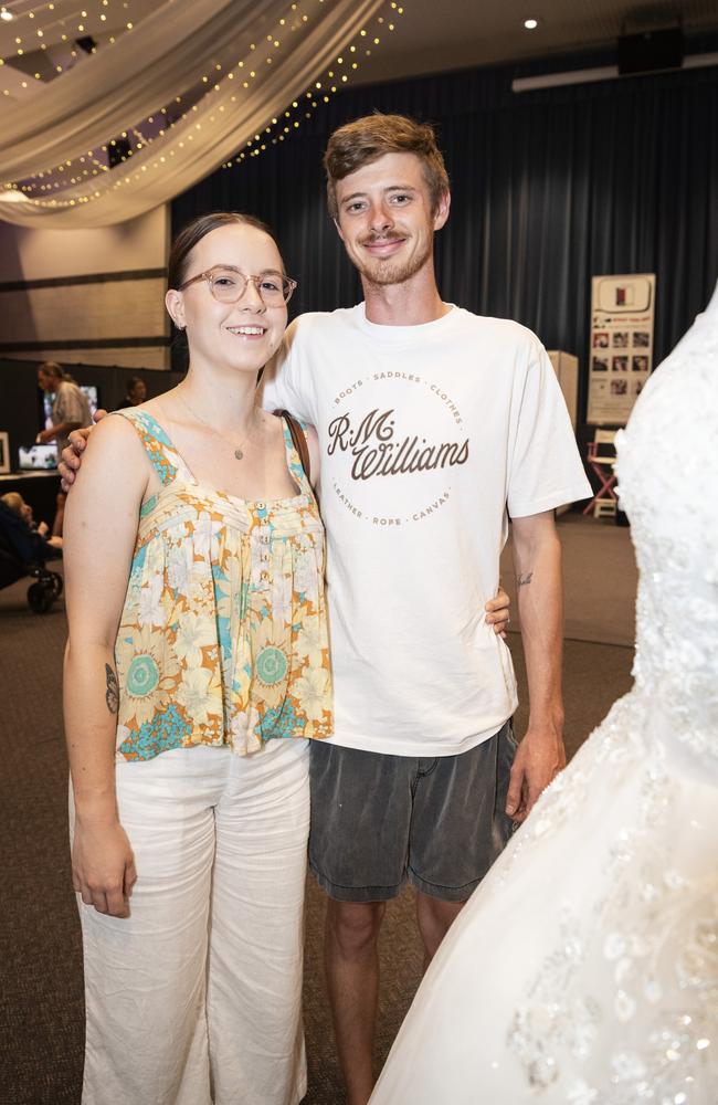 Engaged couple Jaylee Murphy and Troy Bourne with a dress by A touch of Romance at Toowoomba's Wedding Expo hosted by Highfields Cultural Centre, Sunday, January 21, 2024. Picture: Kevin Farmer