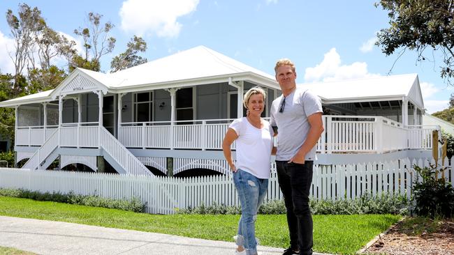 Bianca and Glen Wakelin outside their Queenslander home in Boomerang Beach NSW. The home was transported down in 4 pieces and reassembled in NSW. Pic: Lindsay Moller