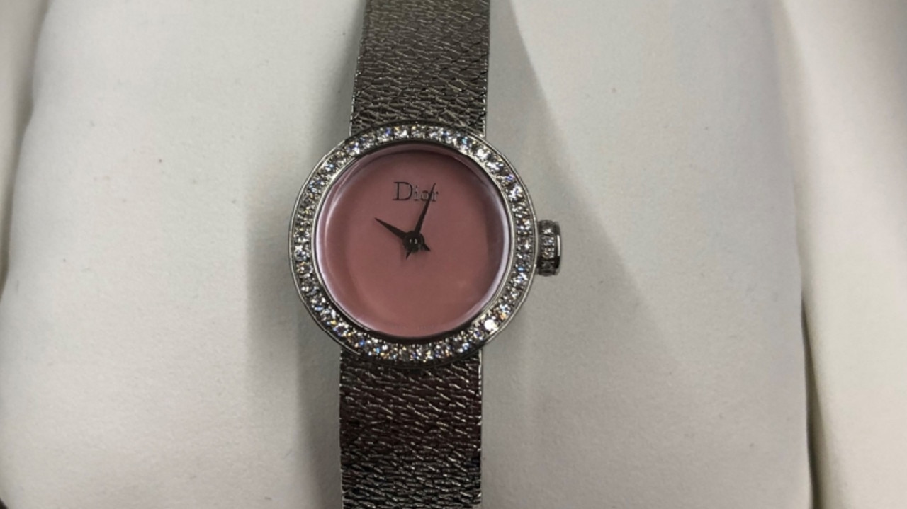 A Christian Dior watch found in the raid.