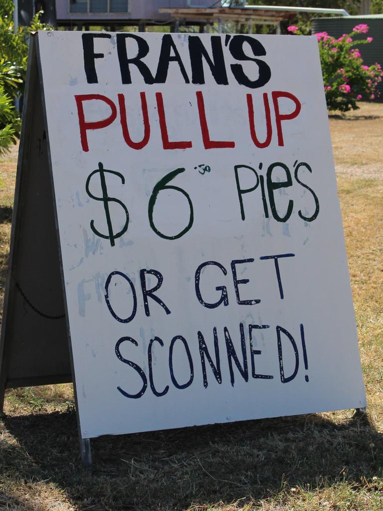 A sign out the front of "Fran's Devonshire tea house" in Larrimah on Thursday. Picture: Jason Walls