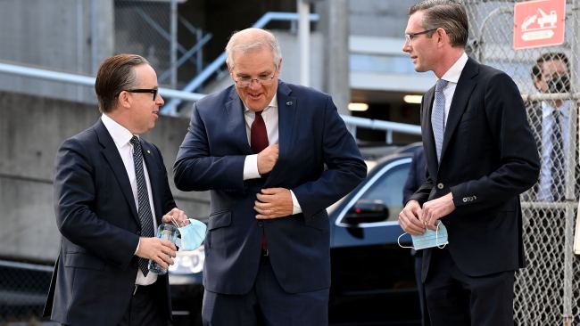 Qantas CEO Alan Joyce, Prime Minister Scott Morrison and NSW Premier Dominic Perrottet are seen before the major announcement on Friday. Picture: NCA NewsWire/Bianca De Marchi