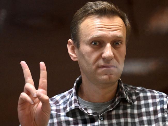 Russian opposition leader Alexei Navalny stands inside a glass cell during a court hearing at the Babushkinsky district court in Moscow. Picture: AFP