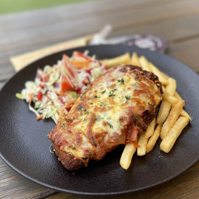 A crispy-cheese-topped chicken parmie on the menu at Oxford 152. Photo: Oxford 152