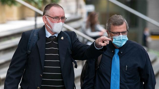 Higgins with his pastor Graham Crews at a prior court appearance. Picture: NCA NewsWire/Bianca De Marchi