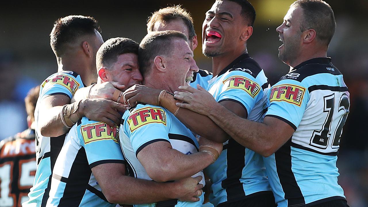 Paul Gallen iced a field goal to seal the Sharks victory over the Tigers.