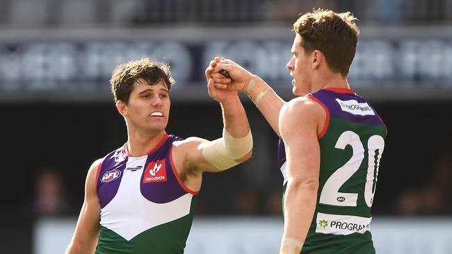 Lachie Schultz and Matt Taberner celebrate a goal. Picture: Getty Images