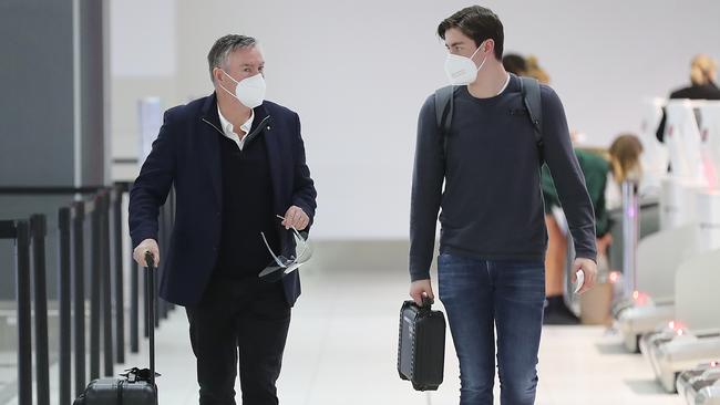 Collingwood President Eddie McGuire and his son on their way to Queensland on Tuesday Picture: Alex Coppel.