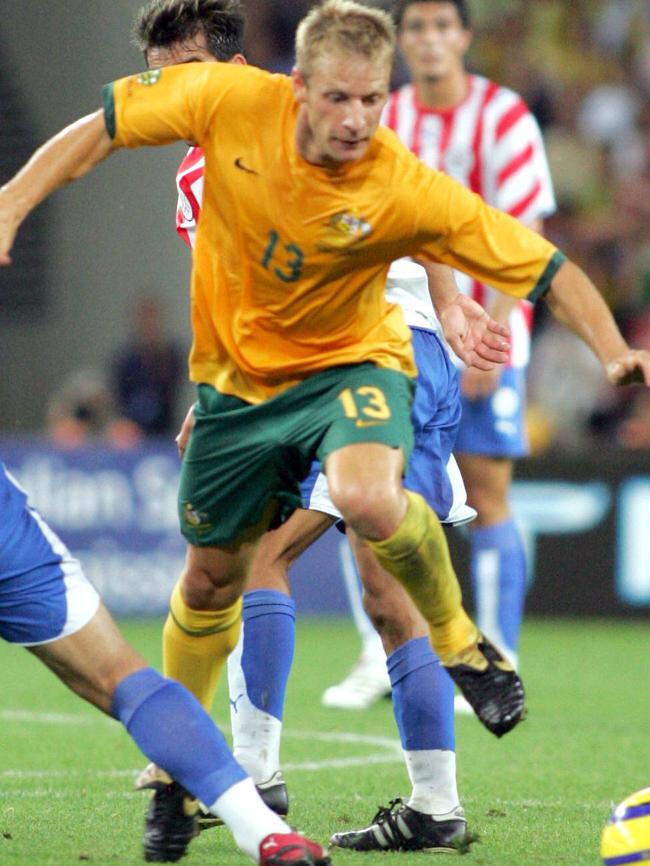 Vince Grella in action against Paraguay.