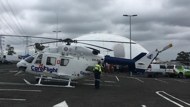 A four-year-old boy has been rushed to hospital after a bike went flying through barricaded at the Sydney Indoor MX Dome.