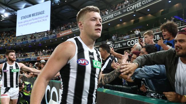 BRISBANE, AUSTRALIA - APRIL 18: Jordan De Goey of the Magpies celebrates winning the round 5 AFL match between Brisbane and Collingwood at The Gabba on April 18, 2019 in Brisbane, Australia. (Photo by Chris Hyde/Getty Images)