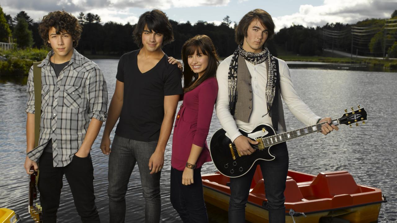 Nick Jonas, Joe Jonas, Demi Lovato and Kevin Jonas in Camp Rock.