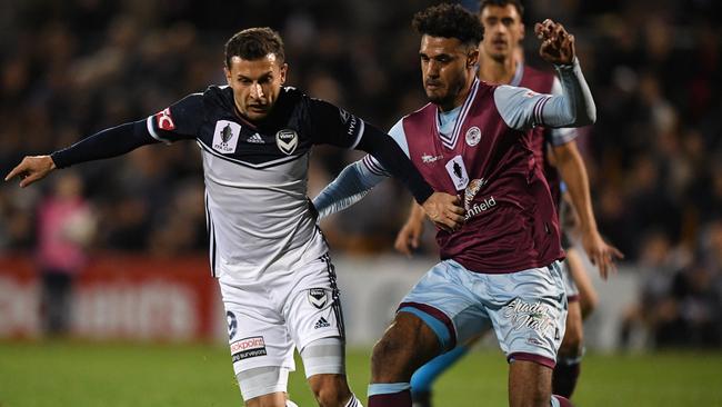 Kosta Barbarouses comes in for some close attention from the APIA defence.