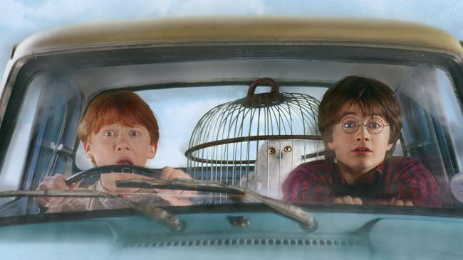 Actor Daniel Radcliffe (r) with Rupert Grint (l) in scene from film Harry Potter and the Chamber of Secrets. /Films/Titles/Harry/Potter/and/the/Chamber/of/Secrets