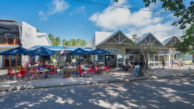 The building at 6 Pacific Drive hosts - Noodies, Horseshoe Bay Fish and Chips, Café Nourish, Island Fever Surfwear. Picture: Raine &amp; Horne.