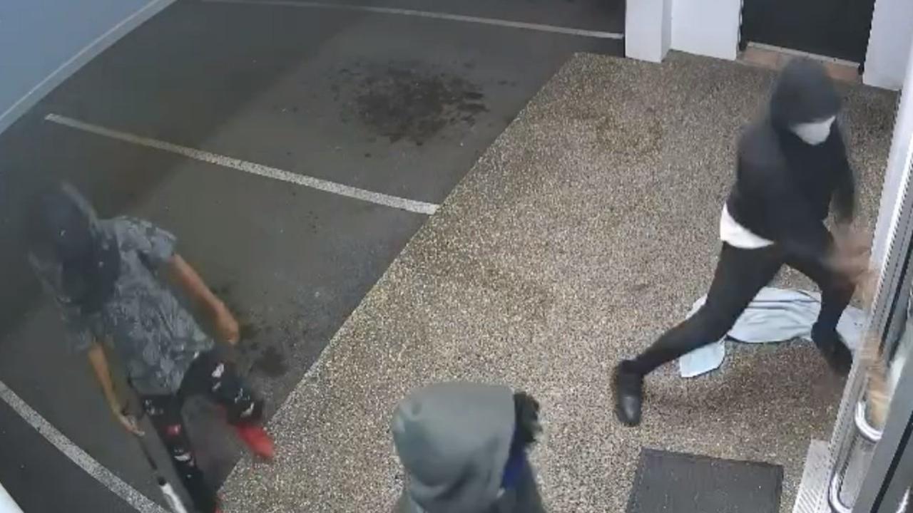 They broke through the doors with baseball bats before setting the business alight, police allege. Picture: Queensland Police Service