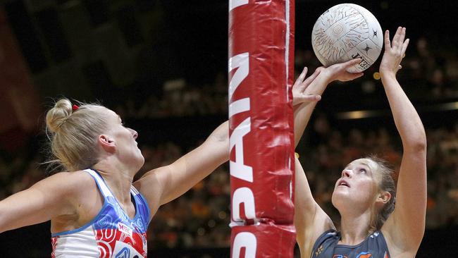 Susan Pettitt of the Giants shoots against the Swifts on Sunday.