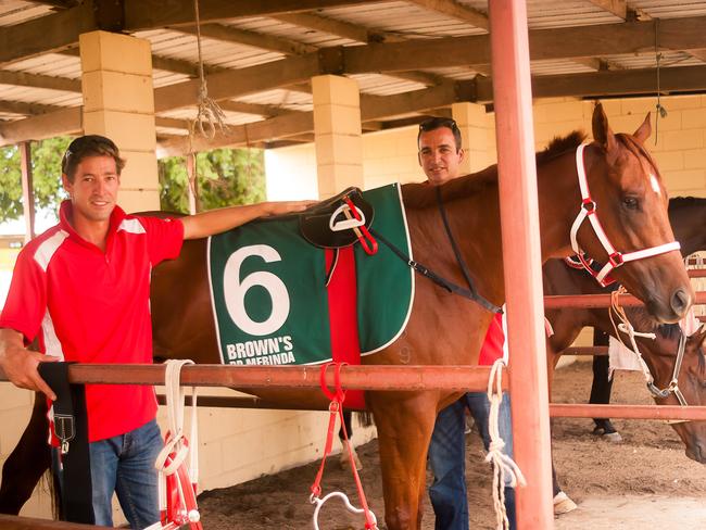 Brothers Jose Joao and Joao Campeao with ‘Prelusive Strike’ at Bowen Turf Club. Picture: Louise Jorgensen