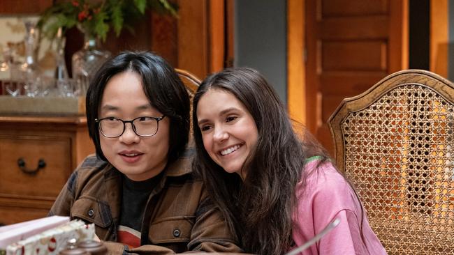 Jimmy O. Yang and Nina Dobrev in Love Hard.