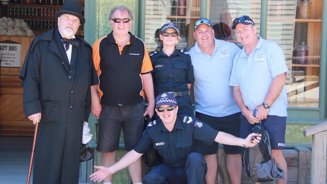 A Sovereign Hill actor with John Moloney, LSC Megan Ferry, Sgt Dave Collins, Sgt Dave Peitsch and LSC Ken Birch at a previous Cops N Kids camp. Photos: Supplied