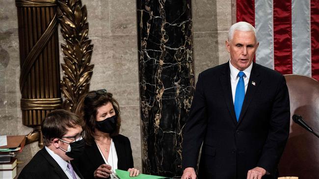 Vice President Mike Pencepictures before his evacuation from the Senate chamber on January 6. Picture: AFP