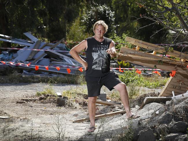 David Filliponi, 57, surrounded by what is left of his neighbours’ homes. Picture: David Caird