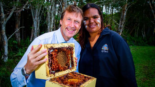 Trainee native bee keeper Cheyenne Doyle with Michael Hodgson from The Star. Picture: Patrick Hamilton