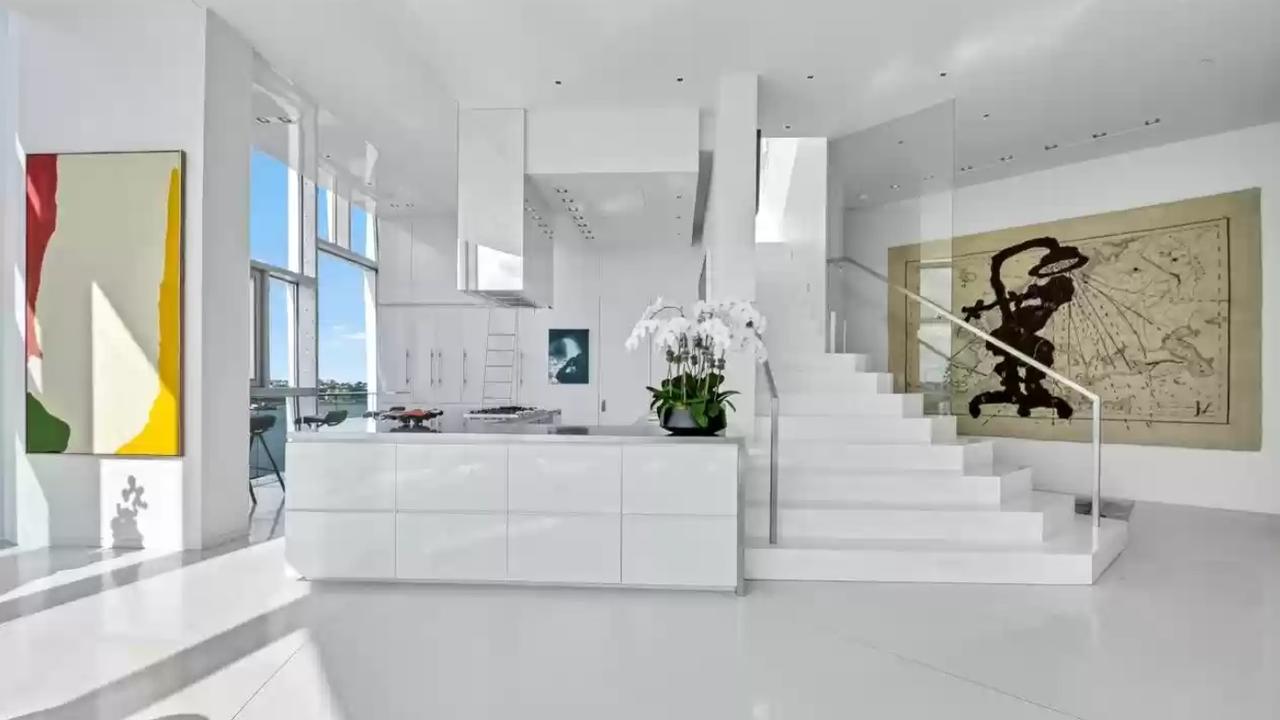 The kitchen and stairs leading to the second level. Picture: Realtor