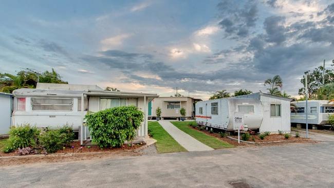 Investigators are at the scene of a fire which wiped out a caravan and its annex, where a family of five was sleeping overnight. Picture: Camira Freedom Lifestyle Park