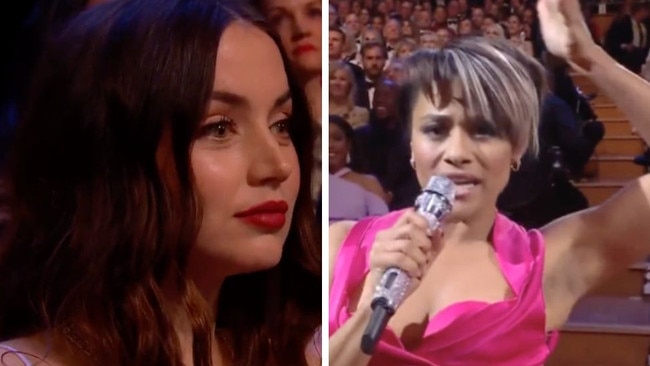 Ana de Armas’ face mirrored all of ours as Ariana DeBose rapped.