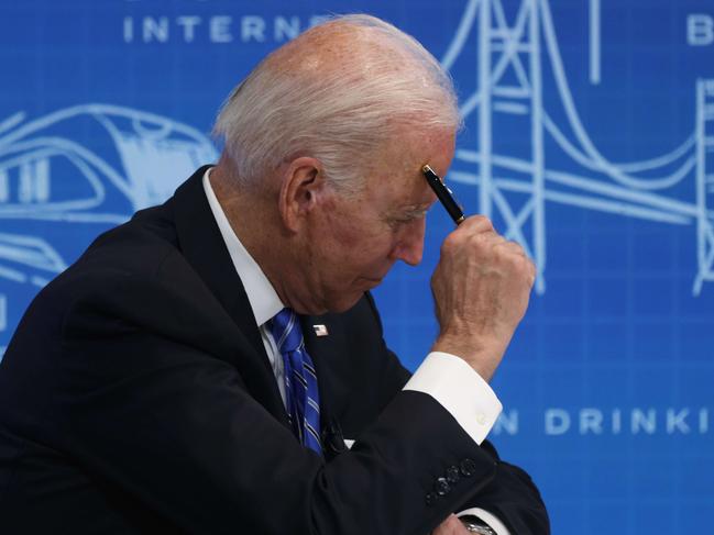 WASHINGTON, DC - AUGUST 11: U.S. President Joe Biden participates in a virtual meeting on Infrastructure Investment and Jobs Act at South Court Auditorium at Eisenhower Executive Office Building August 11, 2021 in Washington, DC. President Biden met with Governors, Mayors, and other states, local, and tribal officials virtually to discuss âthe importance of the bipartisan Infrastructure Investment and Jobs Act to fix crumbling roads and bridges, make a historic investment in transit, modernize water infrastructure, invest in electric vehicle infrastructure, and expand broadband access to all Americans.â   Alex Wong/Getty Images/AFP == FOR NEWSPAPERS, INTERNET, TELCOS & TELEVISION USE ONLY ==