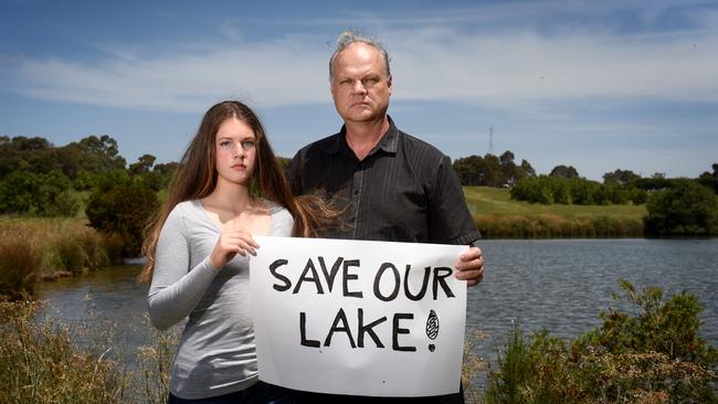 Ferntree Gully's Mark Glazebrook, with his daughter Taya, is worried about the future of the lake. Picture: Kylie Else