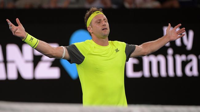 Tennys Sandgren of the United States celebrates his win against Dominic Thiem. (AAP Image/Tracey Nearmy)