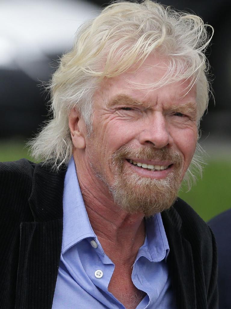 Sir Richard Branson will provide axed employees with signed photo to commemorate their time with the airline. Picture: Daniel Leal-Olivas/AFP