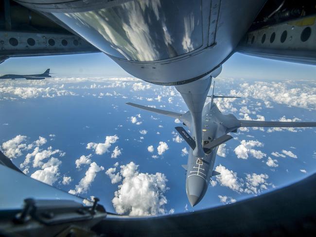 This US Air Force handout photo obtained September 23, 2017 shows an Air Force B-1B Lancer receiving fuel from a KC-135 Stratotanker near the East China Sea, on September 18, 2017.  US bombers accompanied by fighter jets flew off the east coast of North Korea on September 23, 2017 in a show of force designed to project American military power in the face of Pyongyang's weapons programs, the Pentagon said. It was the furthest north of the Demilitarized Zone (DMZ) any US fighter or bomber aircraft have flown off North Korea's coast in this century, Pentagon spokesman Dana White said.   / AFP PHOTO / US AIR FORCE / Peter REFT / RESTRICTED TO EDITORIAL USE - MANDATORY CREDIT "AFP PHOTO / US AAIR FORCE/PETER REFT/HANDOUT" - NO MARKETING NO ADVERTISING CAMPAIGNS - DISTRIBUTED AS A SERVICE TO CLIENTS