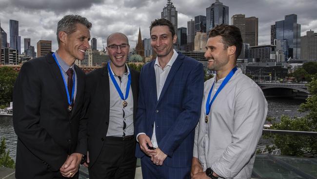 Paul Cooper, Denis Mahoney and Ricky Bolmers were awarded a 2019 Community Hero award by Ambulance Victoria after they saved the life of Nathan Reinhard at a basketball game. (L-R) Paul Cooper, Denis Mahoney, Nathan Reinhard and Ricky Bolmers. Source: Ambulance Victoria