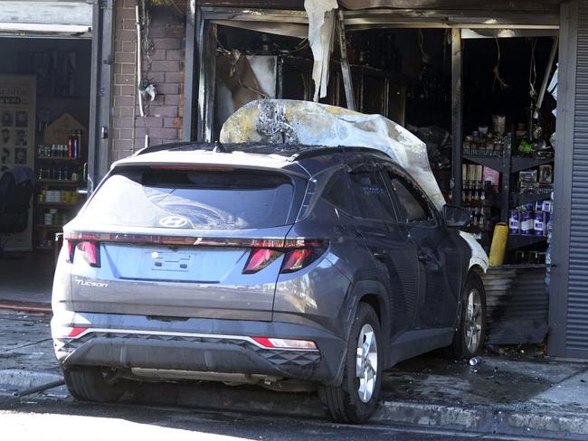 A stolen car rammed into a tobacco store in Hadfield. Picture: Valeriu Campan