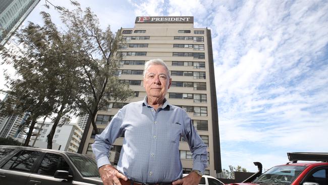 President apartment building is falling apart , concrete cancer, broken lifts and the pool in need of repair. Body corporate President and owner Graham Spottiswood in front of the building. Picture Glenn Hampson