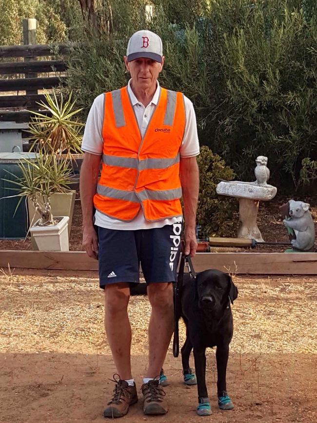 Raymond Meadows and his guide dog, Gerry.