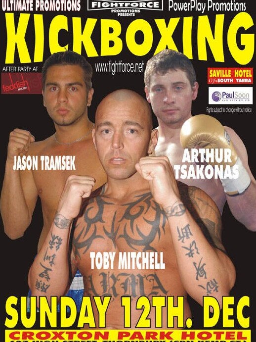 Mitchell showing off his chest tattoos on the cover of Kickboxing magazine.